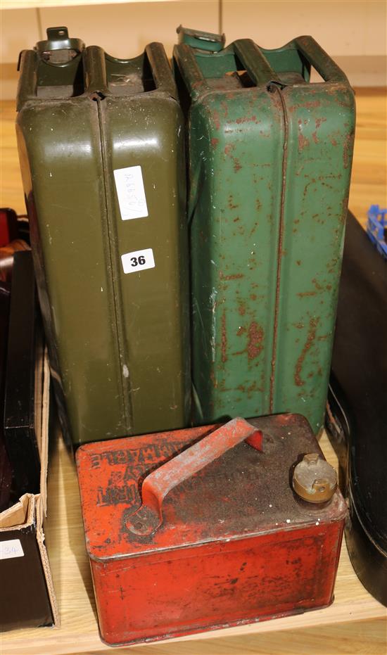 Three vintage petrol cans